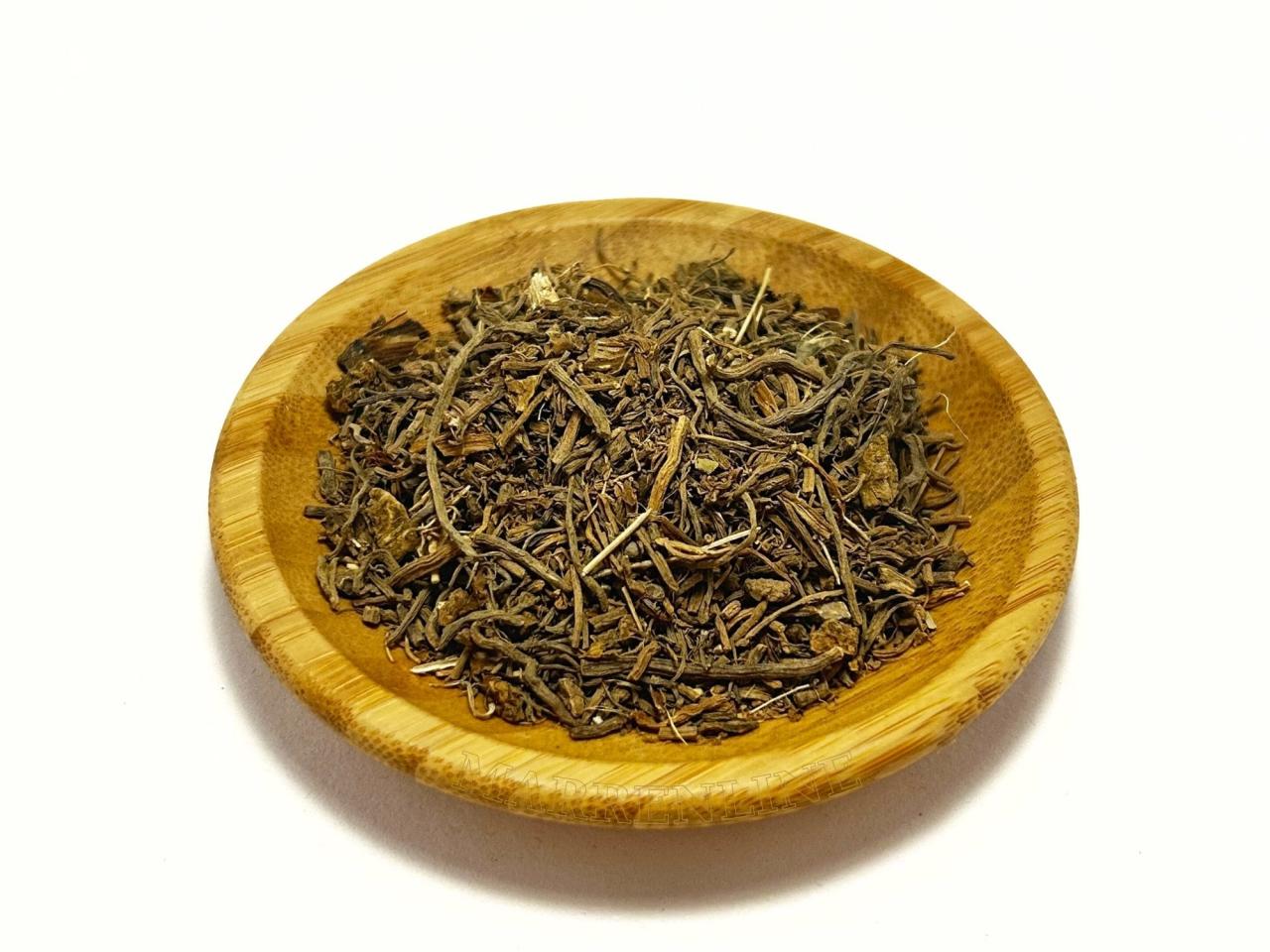 Dried Valerian root pieces (Valeriana officinalis), macro background ...